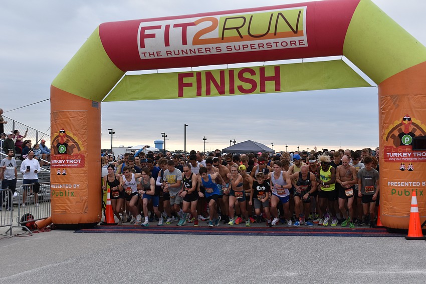 Runners take their first strides at the start of the Florida Turkey Trot at Nathan Benderson Park.
