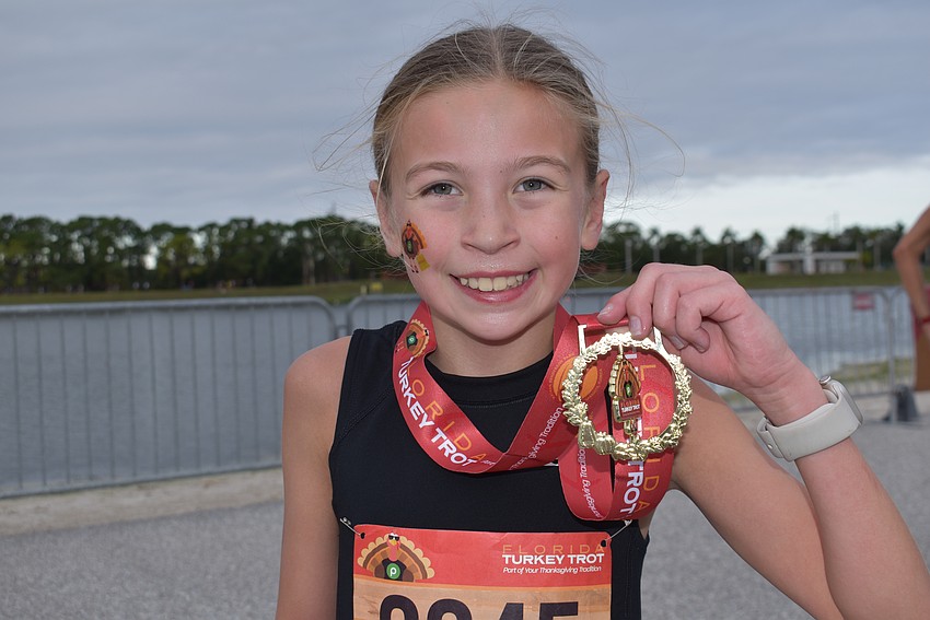 Sterling Howard of Indianapolis made the most of her Thanksgiving trip to see her grandparents in Lakewood Ranch. The 9-year-old ran the 5K in an impressive 19 minutes.