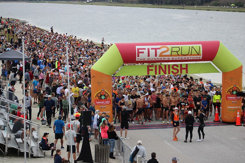 An event record 4,000 runners lined up for the start of the Florida Turkey Trot at Nathan Benderson Park in Sarasota.
