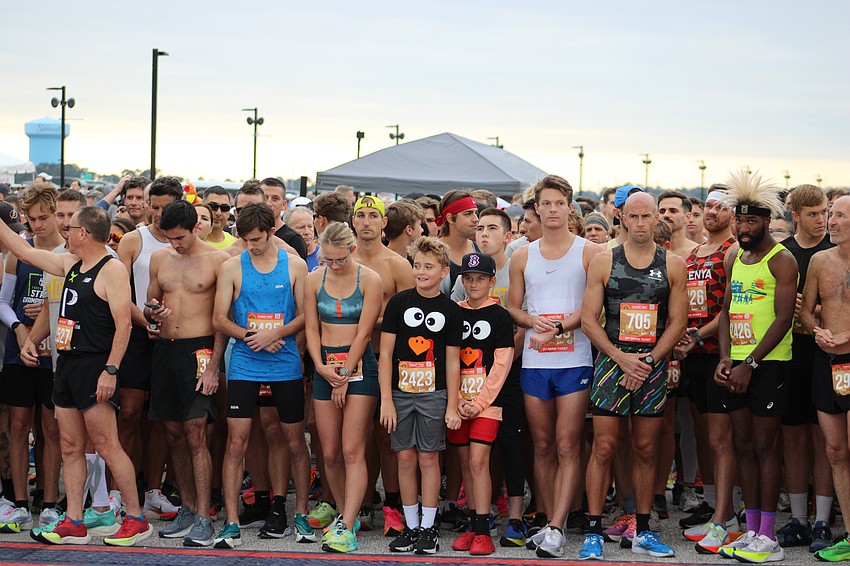 Runners are stuffed together in the front row as they get ready for the start of the Florida Turkey Trot.