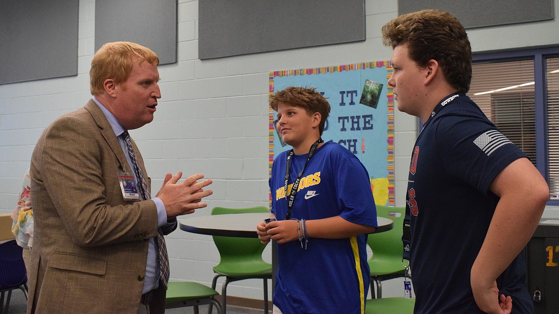 Superintendent Jason Wysong has loved talking to students like R. Dan Nolan Middle School eighth graders Bryce Newman and Hutch Jeanise.