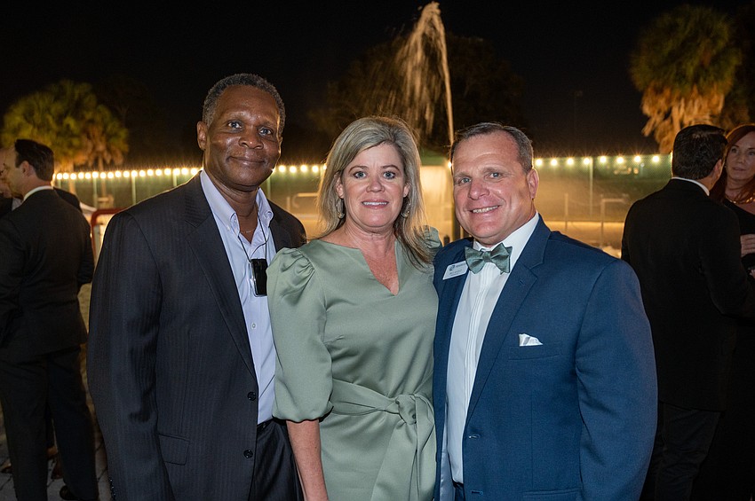 Ken Freeman with Robyn and Bill Sadlo, CEO