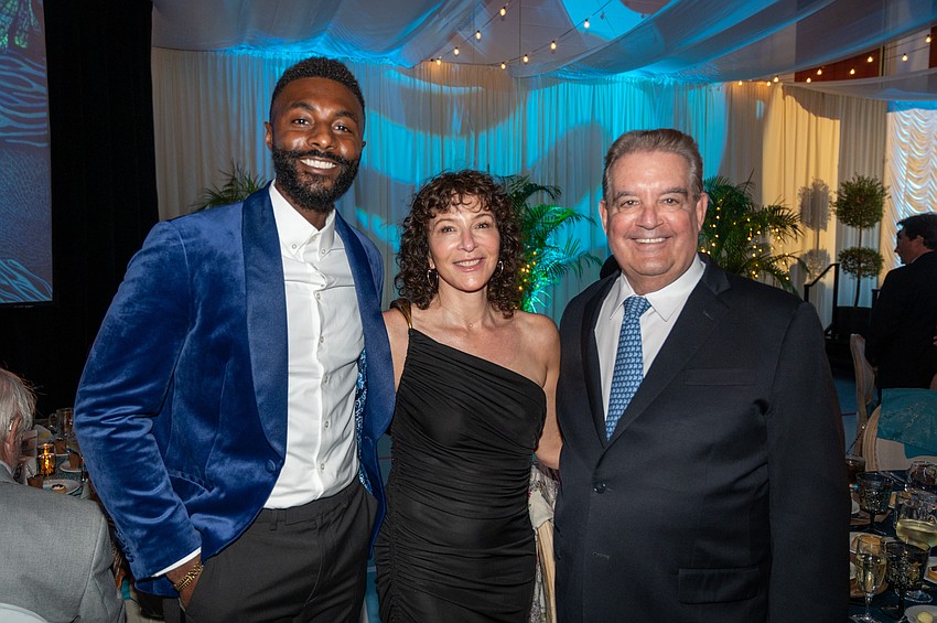 Jeremy Shelby with Christine and Bill Isaac