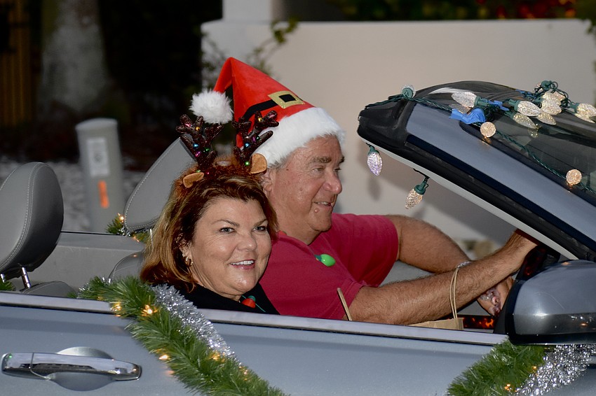 Rebecca and Henry Seiner drive past in the parade.