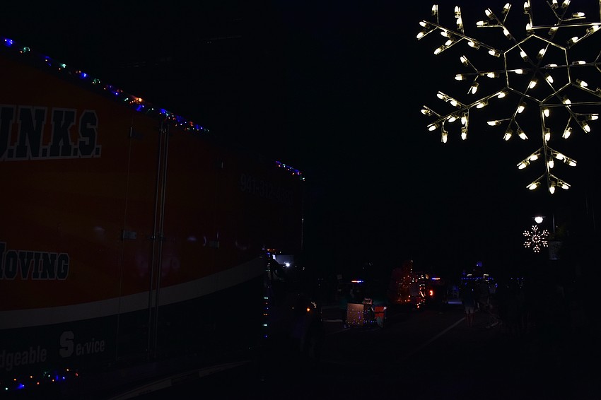 The parade heads down Beach Road.