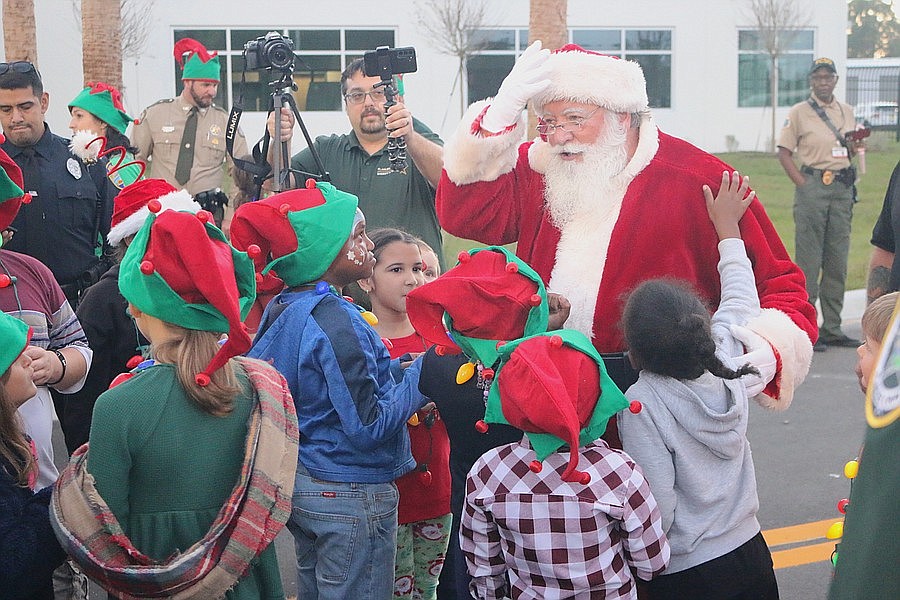 Santa Claus at the 2022 FCSO Shop with a Cop. File photo