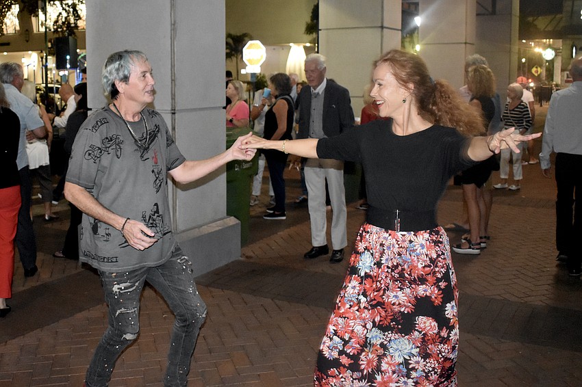 Kirk Maust, founder of DanceEntourage, and Ana Munroe enjoy a dance.