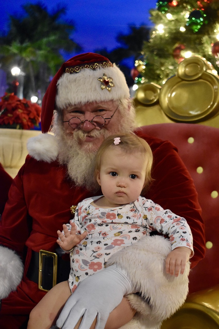 Bennett Pfeifer, 1, could sit in Santa's lap all night.