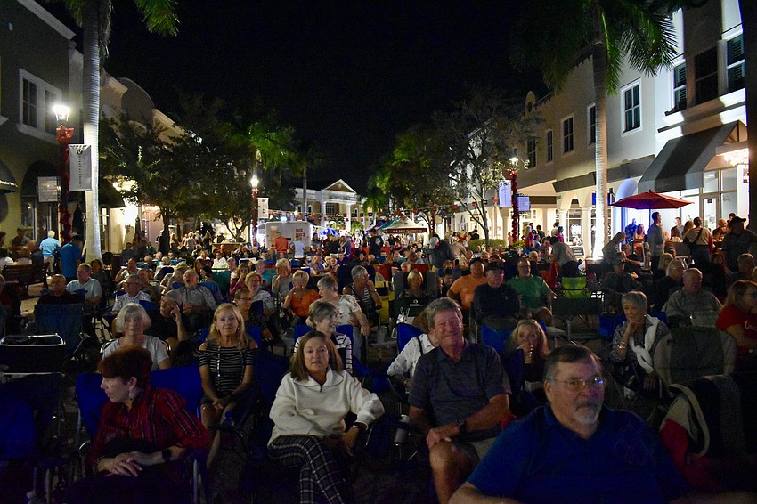 Residents pack Lakewood Ranch Main Street to listen to the band Shell and the Crabs at December's Music on Main.