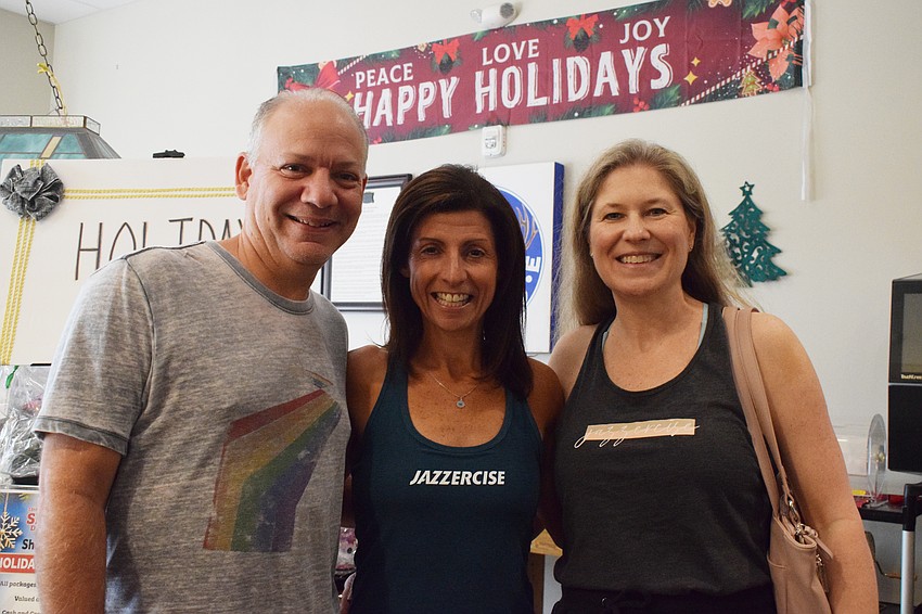 Lakewood Ranch's Jim Nastri, Shari Nastri and Stephanie Wilkinson drop off the 40 boxes Shari Nastri and her Jazzercise clients created.