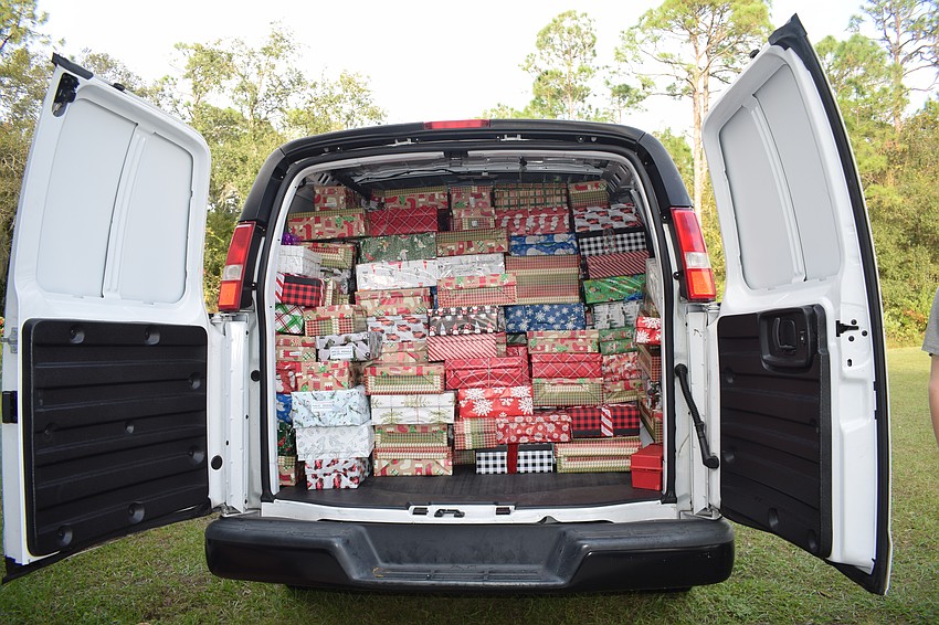 A van is nearly filled with hundreds of shoeboxes for senior citizens throughout Manatee County.