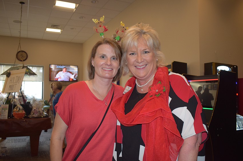 Amy Towery, the vice president of development for Meals on Wheels Plus of Manatee, and Maribeth Phillips, the president and CEO of the nonprofit, are thrilled to see so many shoebox donations.