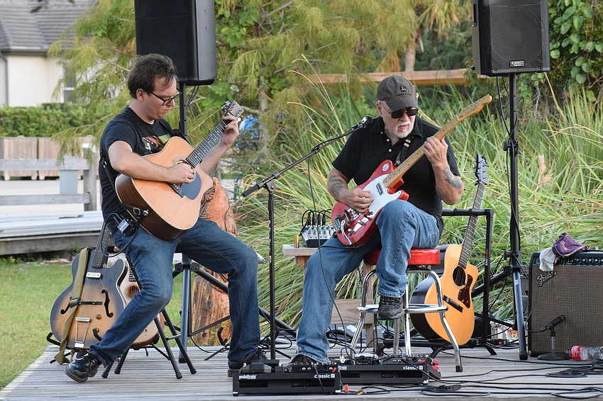 The Divebombers — Nat Langston and George Worthmore — perform prior to the parade.