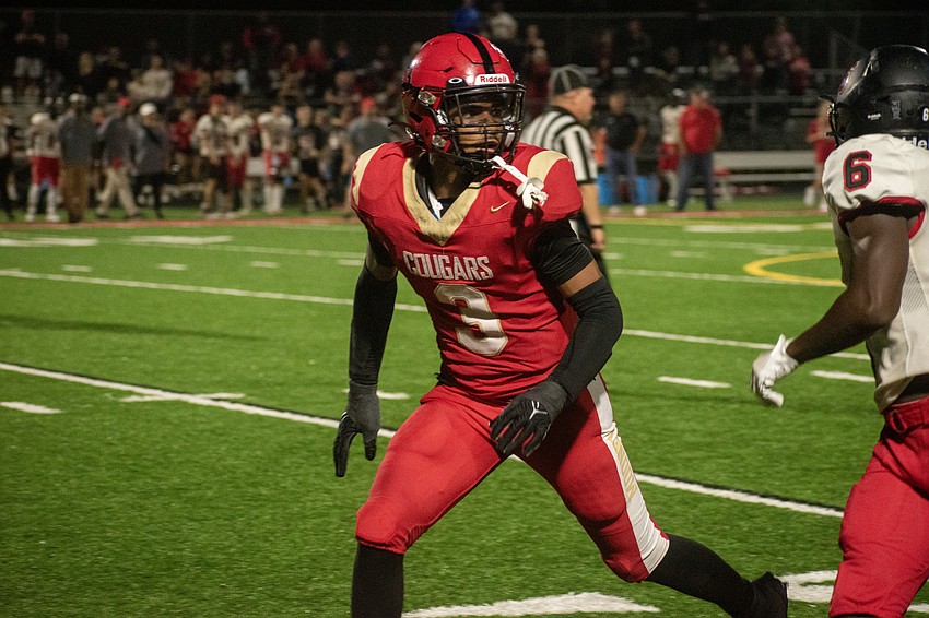 Mooney sophomore defensive back Macaiden Brown tracks NFC receiver Terrion Martin.