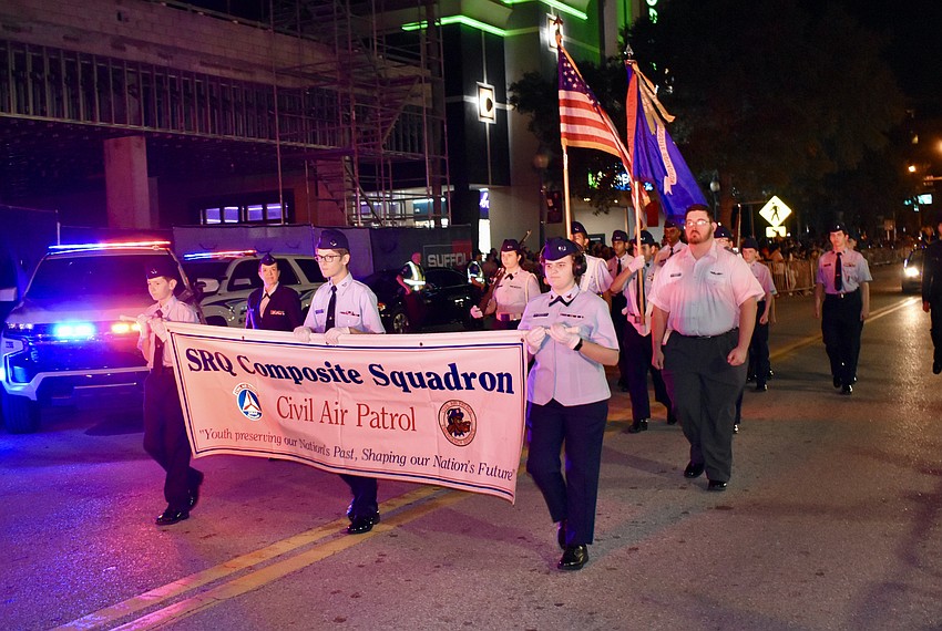 The SRQ Composite Squadron of the Civil Air Patrol marches in the parade.