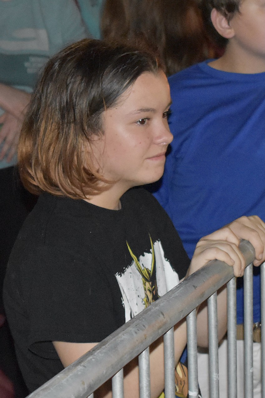 Neviaeh Most, 14, watches the parade.