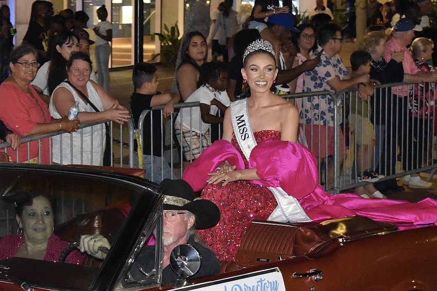 Miss USA 2023 Noelia Voigt, a former Nokomis resident and Pine View student who now lives in Utah, rides in the parade.