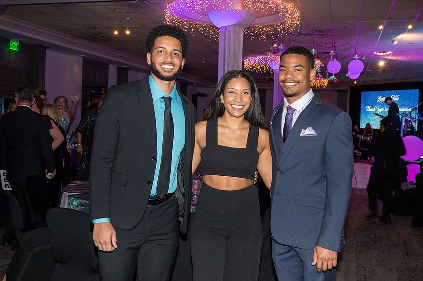 Armando Faucy-Smith with Daria and Miles Curley