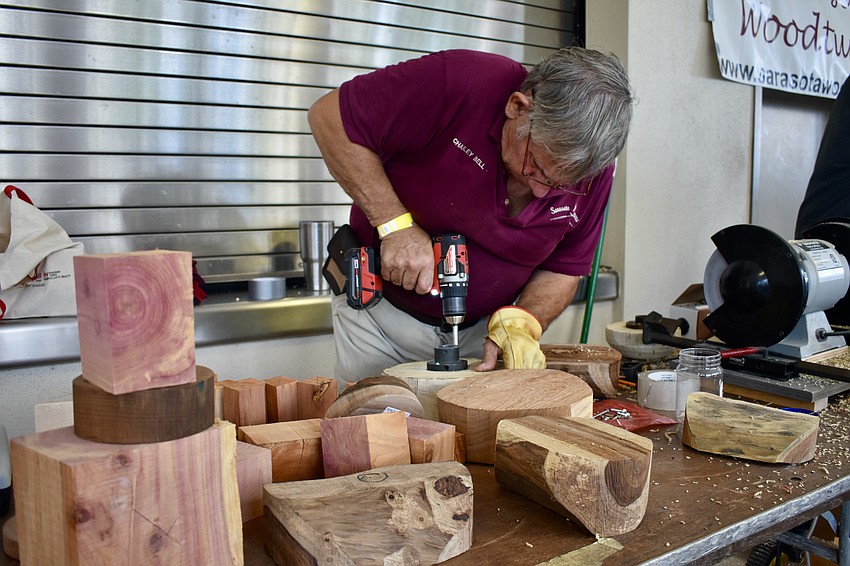 Charley Bell of Sarasota Woodturners offers a demonstration of wood bowl-making.