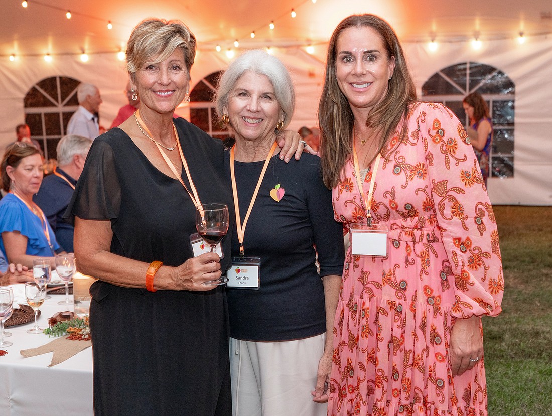 Friends Full of Giving Chair Lisa Napolitano, All Faiths Food Bank CEO Sandra Frank and board Chair Terri Vitale.