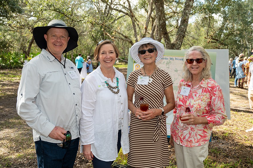 Bill Johnson and Conservation Foundation of the Gulf Coast President Christine Johnson with Marie Baumann and Pam Bournival
