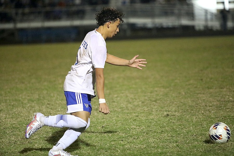 Matanzas soccer player Sergio Posada gets ready to boot the ball in the district championship game against Seabreeze last season. Posada scored two goals against the Sandcrabs on Dec. 1. File photo by Brent Woronoff