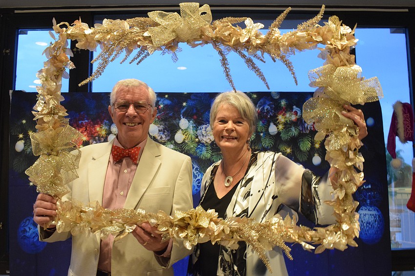 River Club's Norman and Joan Pritchard say the Jingle Ball is an opportunity for them to spend time with neighbors while enjoying a relaxing evening.