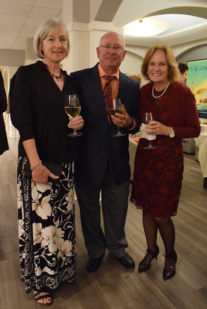 River Club's Karin Pape and Phil Pape haven't seen their friend and fellow River Club resident Claudia Divoll since last November. The Jingle Ball was the perfect opportunity for them to reunite.