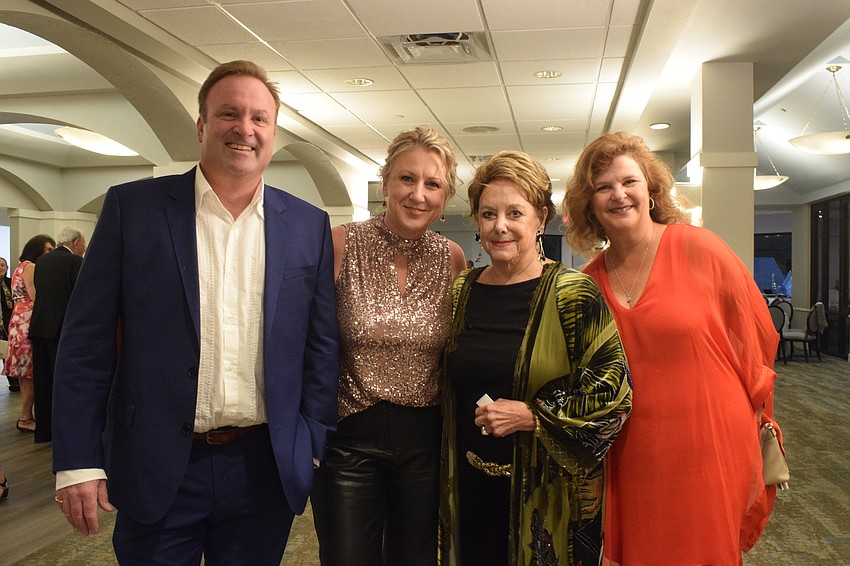River Club's Mark Sinclair, Jane Ebury, Jeanne Sheridan and Cathy Darilek are ready to be in the holiday spirit. 