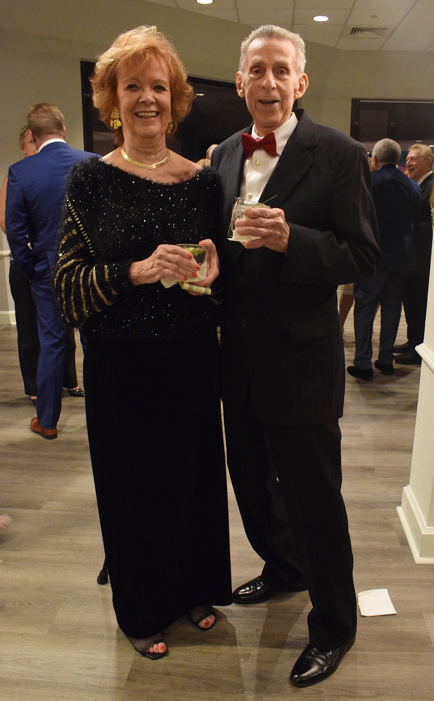 River Club's Ruth Adcox and Gregory Gallagher spend time catching up.