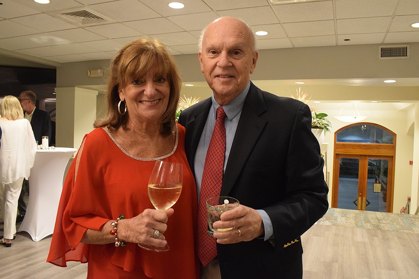 River Club's Joanne and Ron Lebel are ready for a night of festive fun with neighbors.
