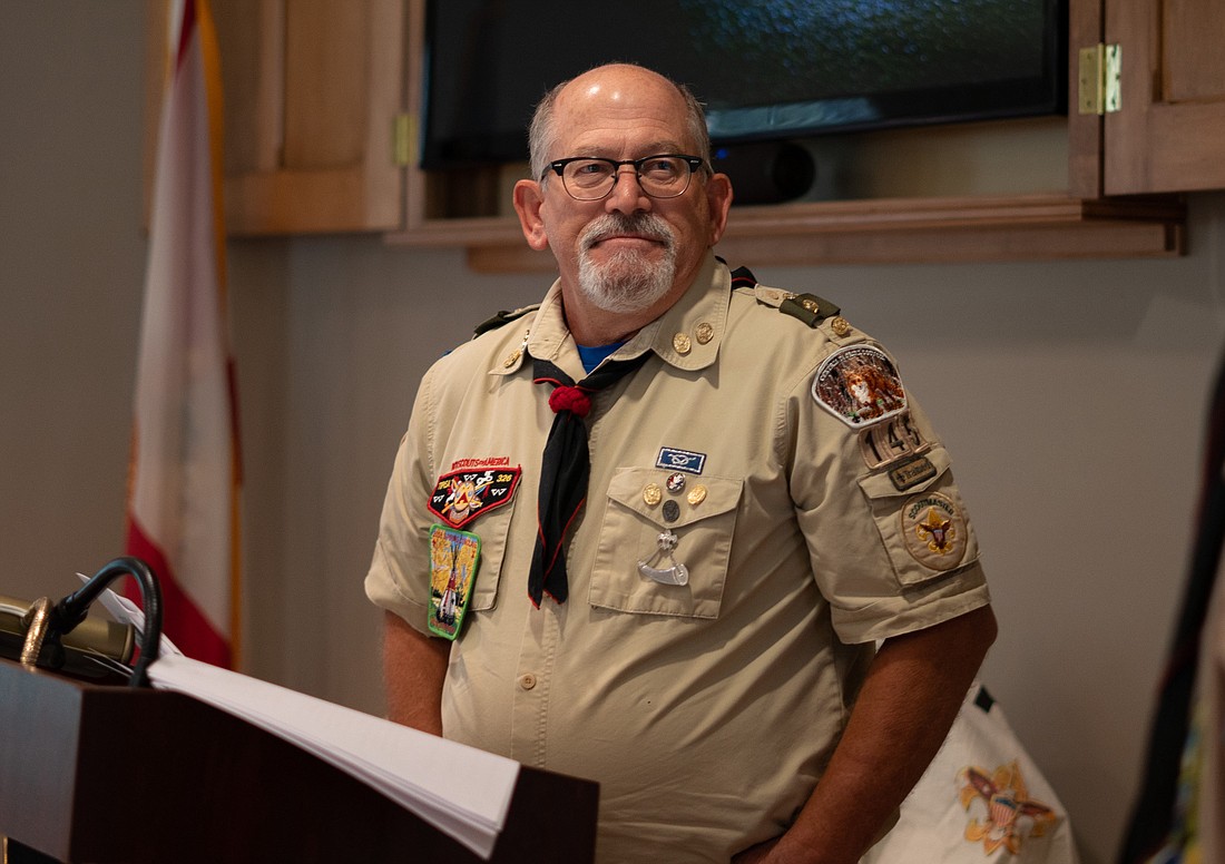 Scoutmaster Todd Shaw recognized one of his scouts during his Eagle Court of Honor.