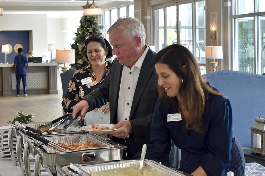 Kenji Trujillo, Jack Brill and Yolanda Mancha enjoy their lunch.