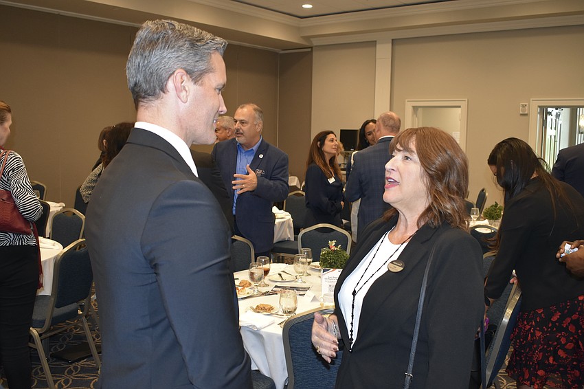 Terry Connor talks with Janet Hazuda.