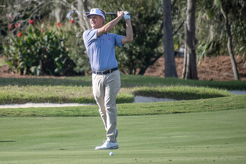 Team USA's David Toms hits a shot on the No. 9 hole at The Concession Golf Club. Toms and teammate Brett Quigley earned nine points for their team during the afternoon Scotch Sixsome session on day one of the World Champions Cup.