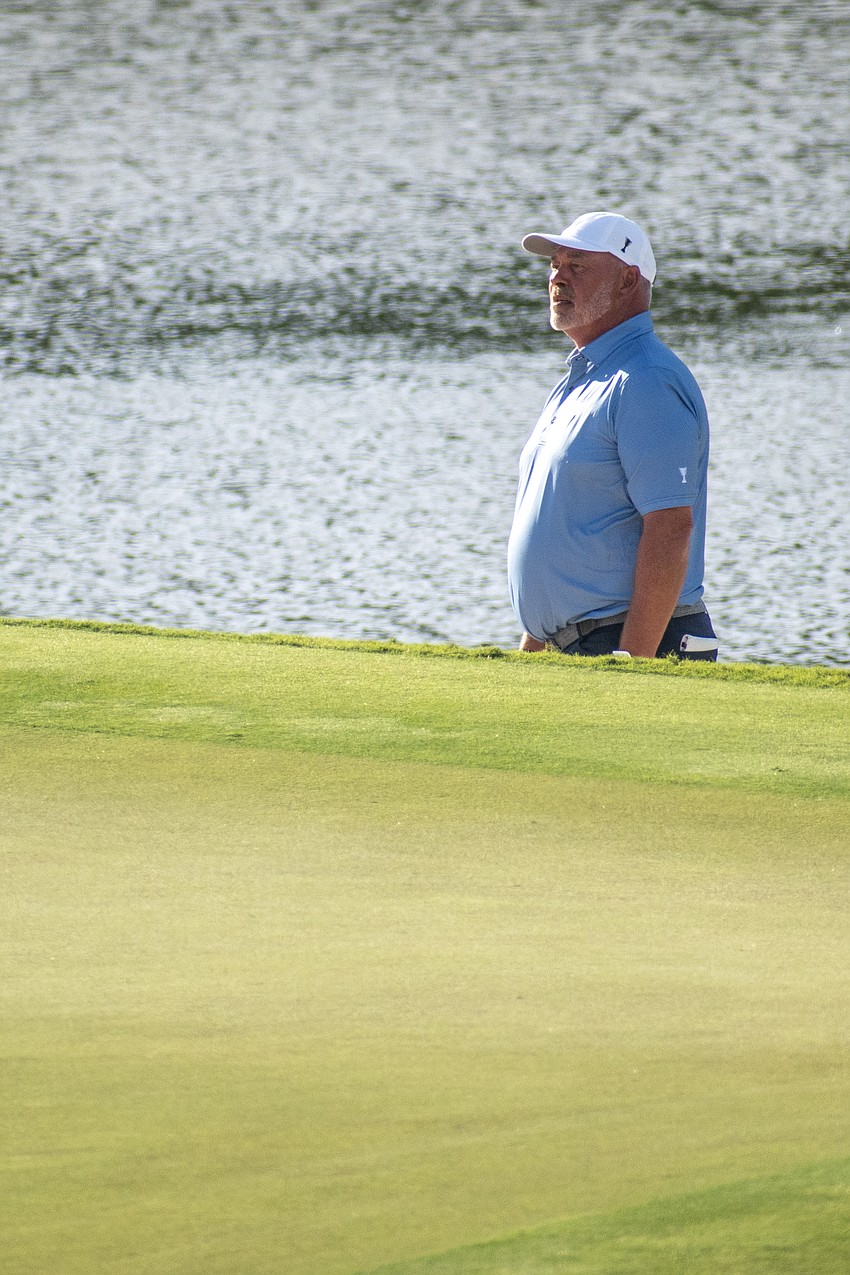 Team Europe's Darren Clarke looks at the No. 9 green at The Concession Golf Club before his chip shot during the Scotch Sixsome session of day one of the World Champions Cup.