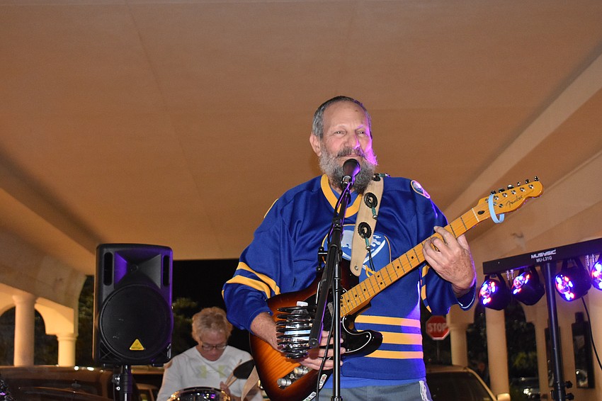 The Rappin' Rockin' Reggae Rabbi Dr. Laz performs for the crowd.