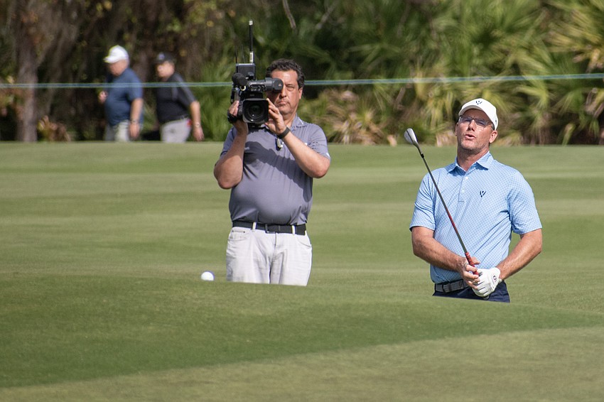 Team Europe's Robert Karlsson gives a disappointed look after his shot onto the No. 8 green at The Concession Golf Club on day two of the World Champions Cup. Karlsson and teammate Miguel Angel Jimenez would birdie the hole during the day's Six Ball session.