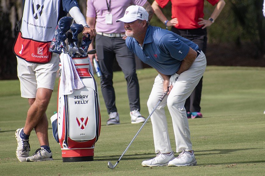 Team USA's Jerry Kelly waits in anticipation for his second shot on the No. 9 hole at The Concession Golf Club to land on day two of the World Champions Cup. Kelly and teammate Justin Leonard would birdie the hole during the day's Six Ball session.