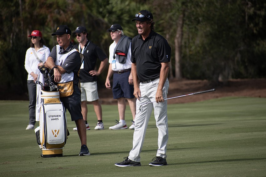 Team International's Stephen Ames grimaces while watching his second shot on the No. 9 hole at The Concession Golf Club on day two of the World Champions Cup. Ames and teammate Vijay Singh would bogey the hole during the day's Six Ball session.