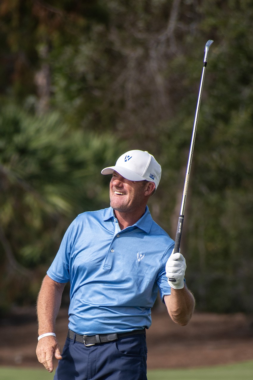 Team Europe's Alex Cejka watches his second shot on the No. 9 hole at The Concession Golf Club on day two of the World Champions Cup. Cejka and teammate Bernhard Langer would bogey the hole during the day's Six Ball session.