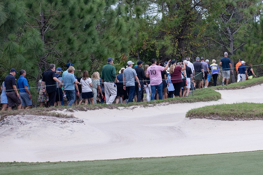 Fans follow the final group of the day (Kelly/Leonard; Langer/Cejka; and Singh/Ames) onto the No. 4 green at The Concession Golf Club on day two of the World Champions Cup.