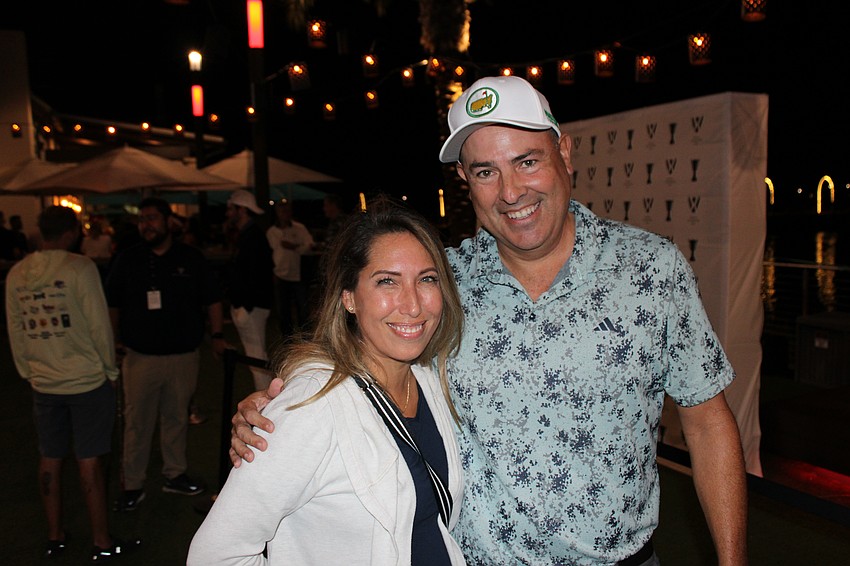 Karen and Dean Boeving won a pair of tickets to the World Champions Cup round on Sunday after Dean chipped into a bucket during a game at the block party Friday night at Waterside Place.