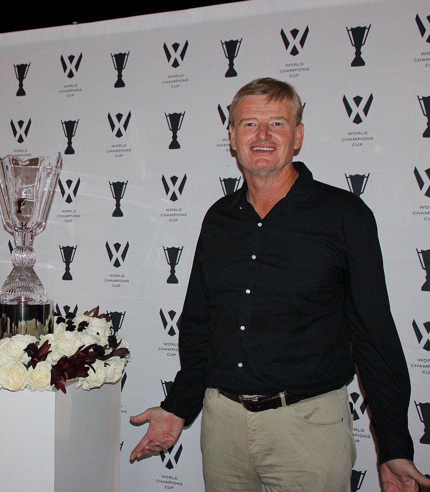 World Golf Hall of Famer Ernie Els has some fun with the crowd at 
Waterside Place during the block party.