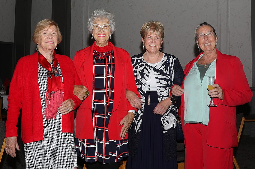 Anne Murfin, Sandra Brookshire, Barbara Skentzos and Victoria Weaver mingle before lunching together.
