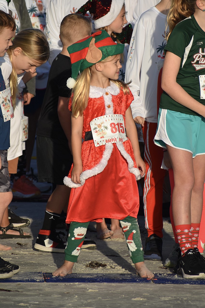 Cece Wilson, 4, prepares to start the fun run.