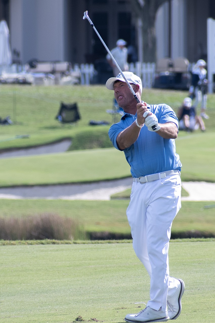 Team Europe's Alex Cejka hits his second shot on the No. 1 hole at The Concession Golf Club on the final day of the World Champions Cup. Cejka would par the hole and earn one point.
