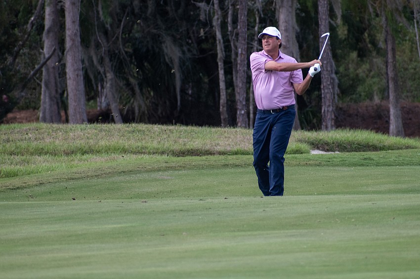Team USA's Billy Andrade hits his second shot on the No. 9 hole at The Concession Golf Club on the final day of the World Champions Cup. Andrade would eventually par the hole to earn 1.5 points.
