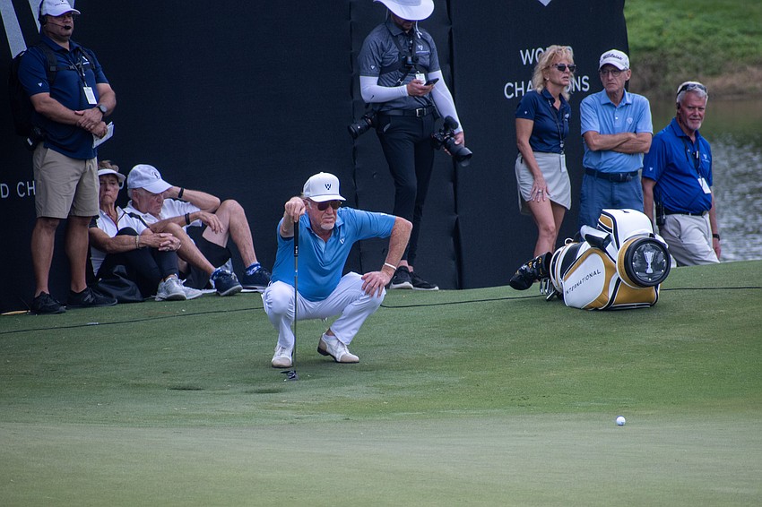 Team Europe's Miguel Angel Jimenez stares down a putt on the No. 9 hole at The Concession Golf Club on the final day of the World Champions Cup. Jimenez would par the hole to earn 1.5 points.