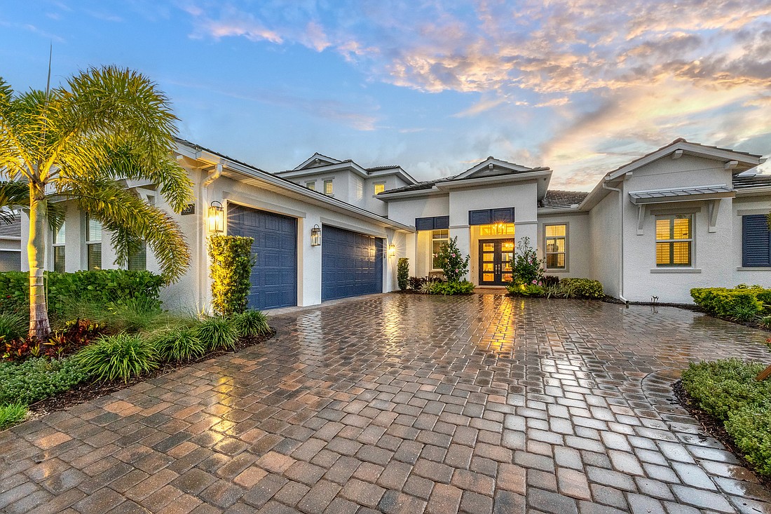 This Isles home at 8327 Redonda Loop sold for $1,825,000. It has three bedrooms, three-and-a-half baths, a pool and 3,346 square feet of living area.